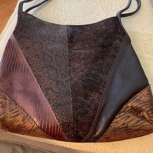 Vintage leather and skin bag. Very unusual!
